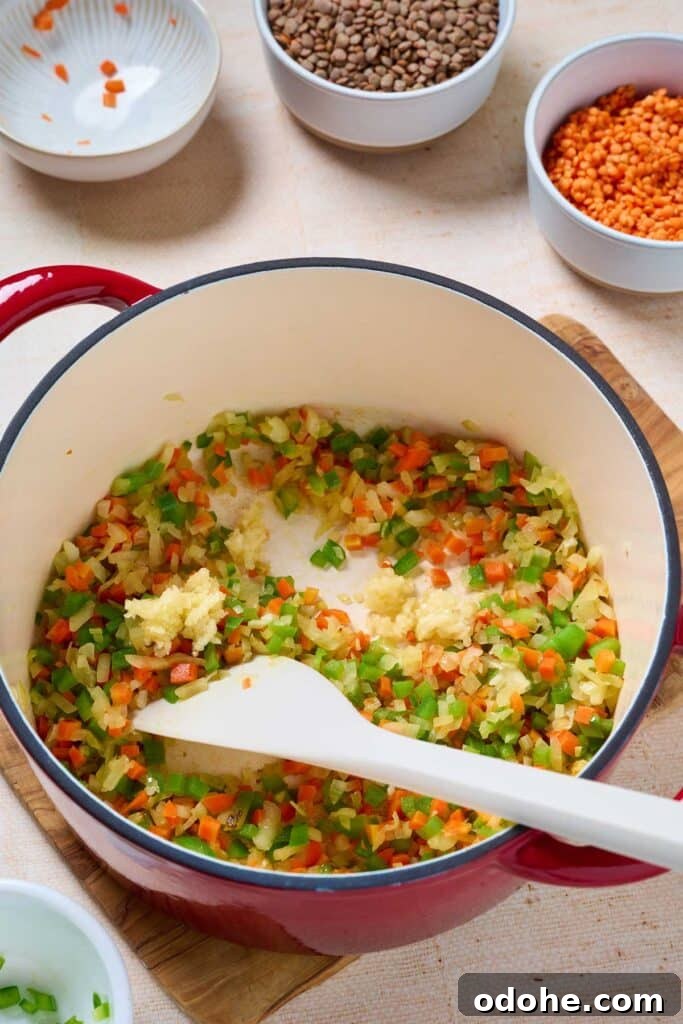 Cincinnati-Style Lentil Chili Recipe for Rich, Hearty Flavor 5 Fresh minced garlic, added into a Dutch oven with sautéed vegetables.