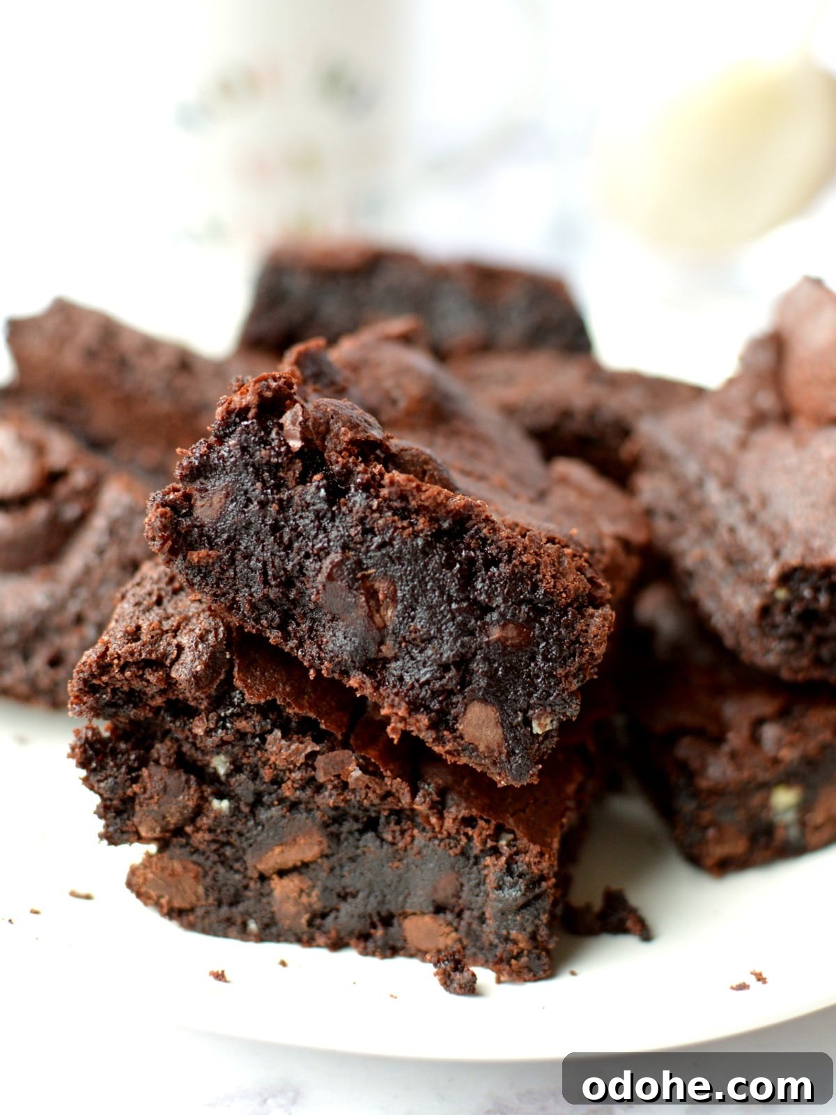 Fudgy Almond Flour Brownies Recipe — Gluten-Free Chocolate Treat 2 a stack of fudge brownies