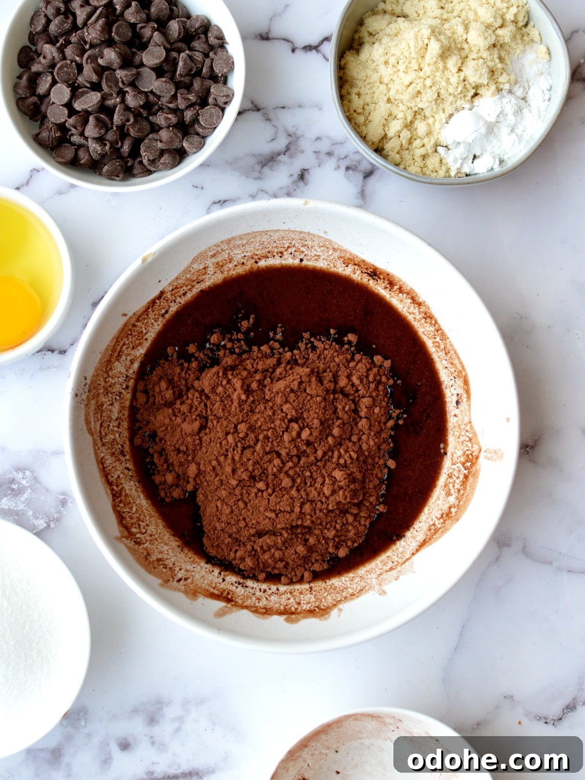 Fudgy Almond Flour Brownies Recipe — Gluten-Free Chocolate Treat 4 melted butter and chocolate with cocoa powder
