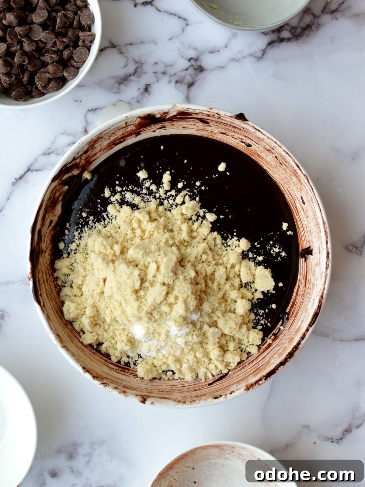 Fudgy Almond Flour Brownies Recipe — Gluten-Free Chocolate Treat 6 brownie batter with almond flour on it
