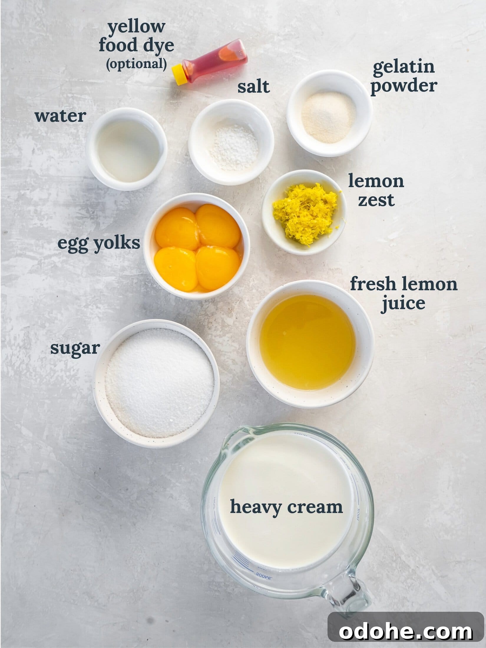 Homemade Lemon Mousse Recipe: Light, Zesty, from Scratch 3 Small bowls with cream, egg yolks, sugar, lemon juice and zest.