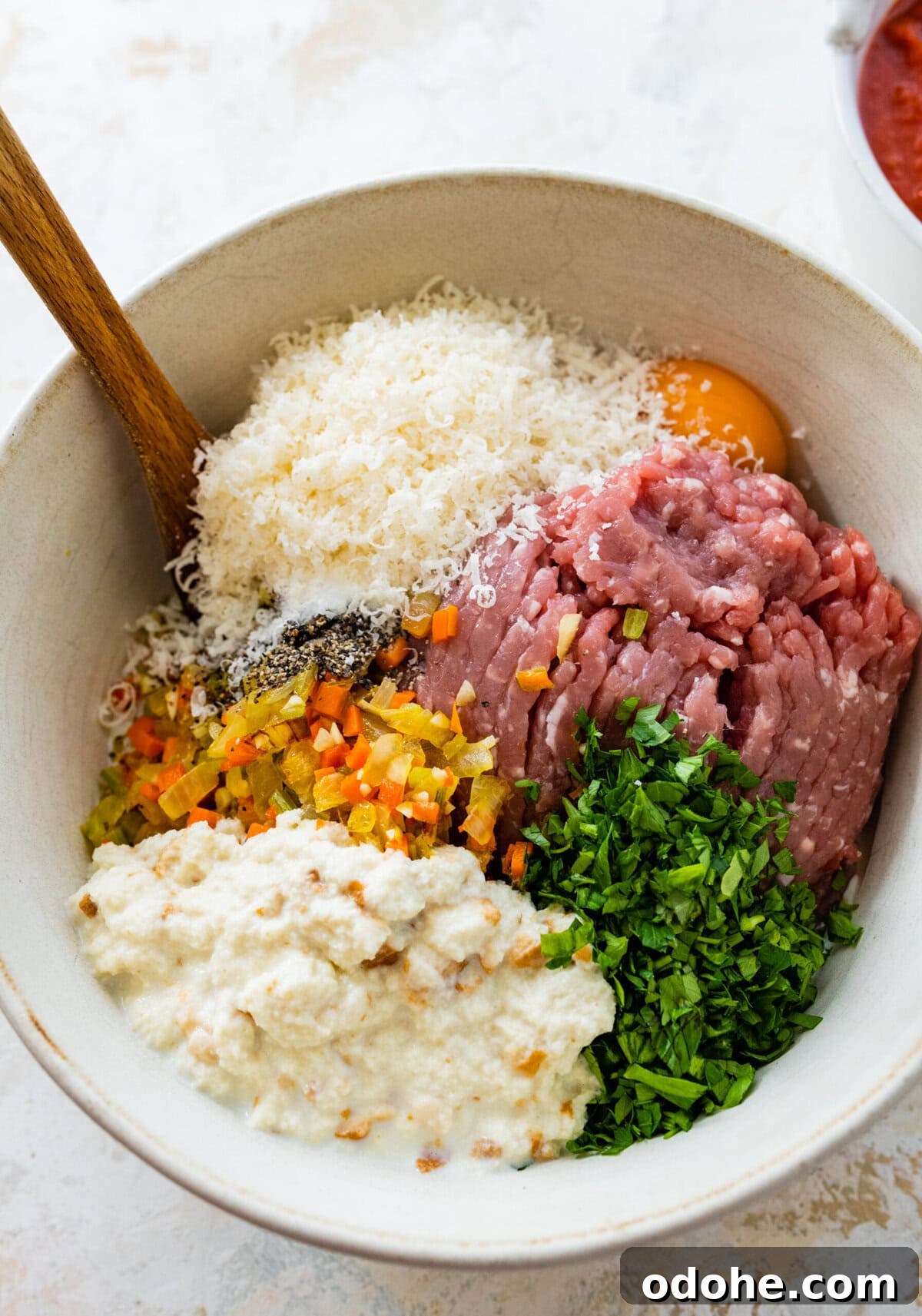 all ingredients for Italian meatloaf in a bowl.