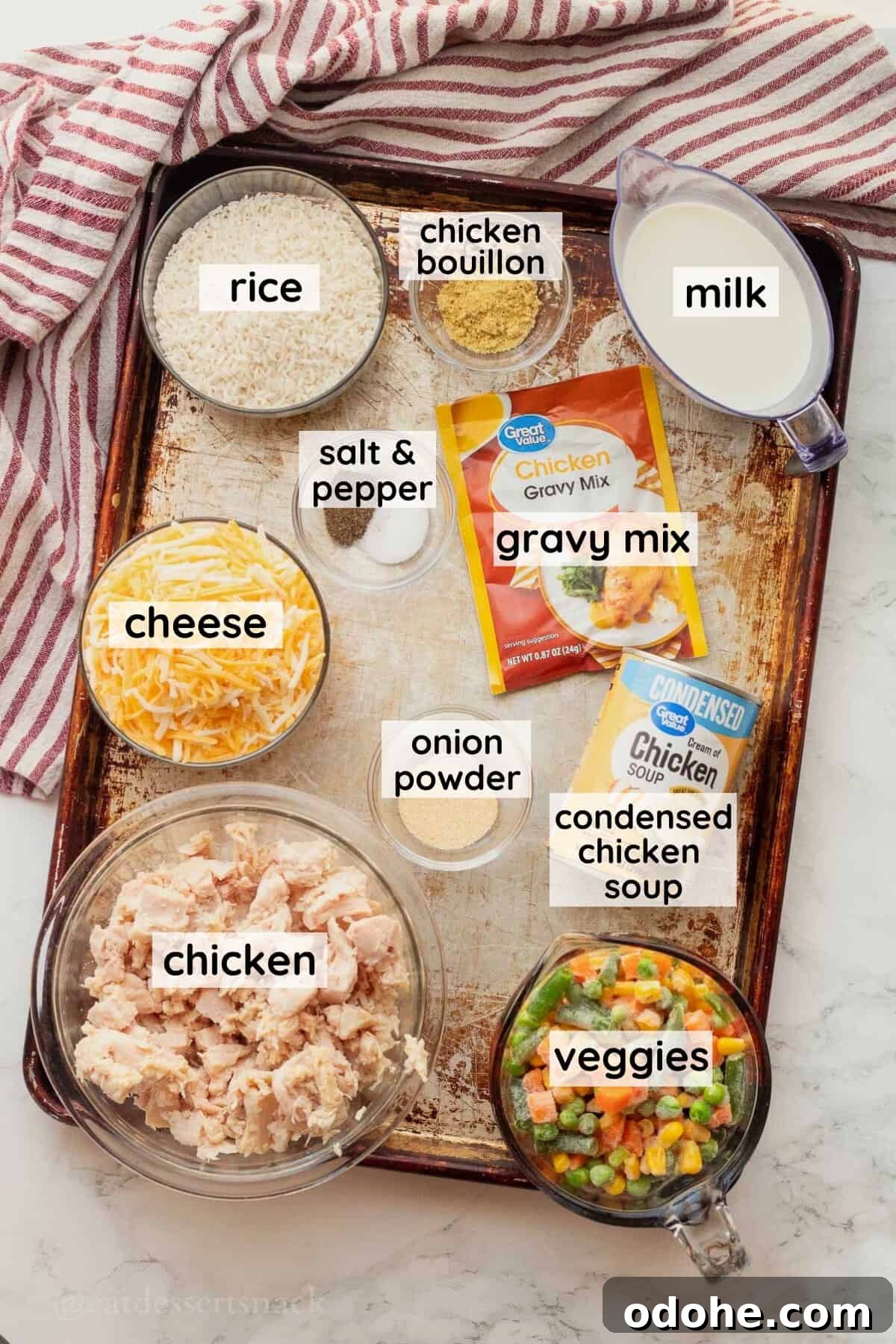 Cheesy Chicken, Rice & Veggie Casserole Recipe 3 Labeled ingredients for chicken rice and veggies casserole in glass dishes on metal pan.