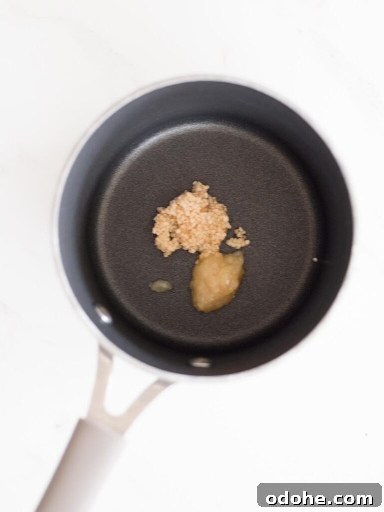 Sticky-Sauce Chicken Meatballs with Sweet Glaze 12 garlic and ginger in a saucepan