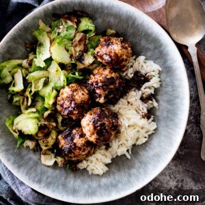 Sticky-Sauce Chicken Meatballs with Sweet Glaze 17 sticky sweet chicken meatballs in a bowl with rice and brussels sprouts