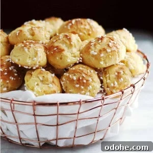 chouquettes served in a cloth lined copper basket