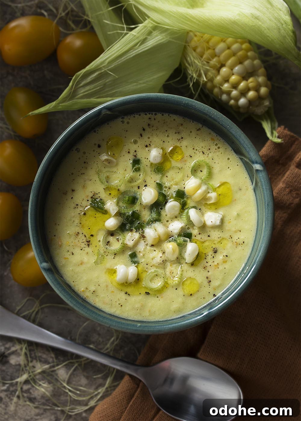 Corn gazpacho is a sweet and spicy cold soup which is refreshing for summer! Easy and quick, it's full of fresh corn, yellow tomatoes, and spicy peppers.