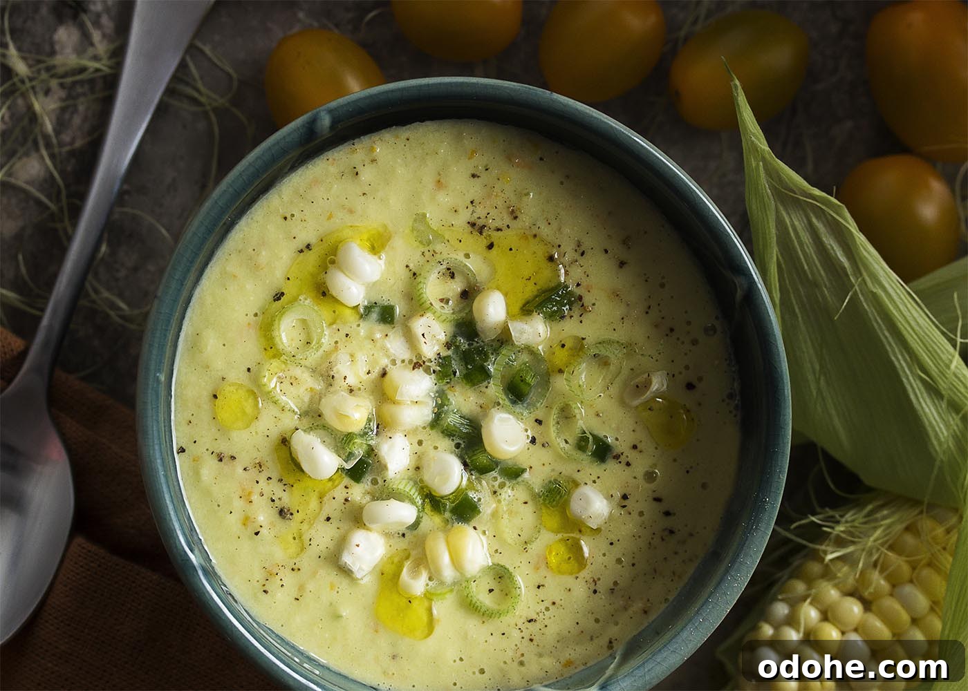 Corn gazpacho is a sweet and spicy cold soup which is refreshing for summer! Easy and quick, it's full of fresh corn, yellow tomatoes, and spicy peppers.