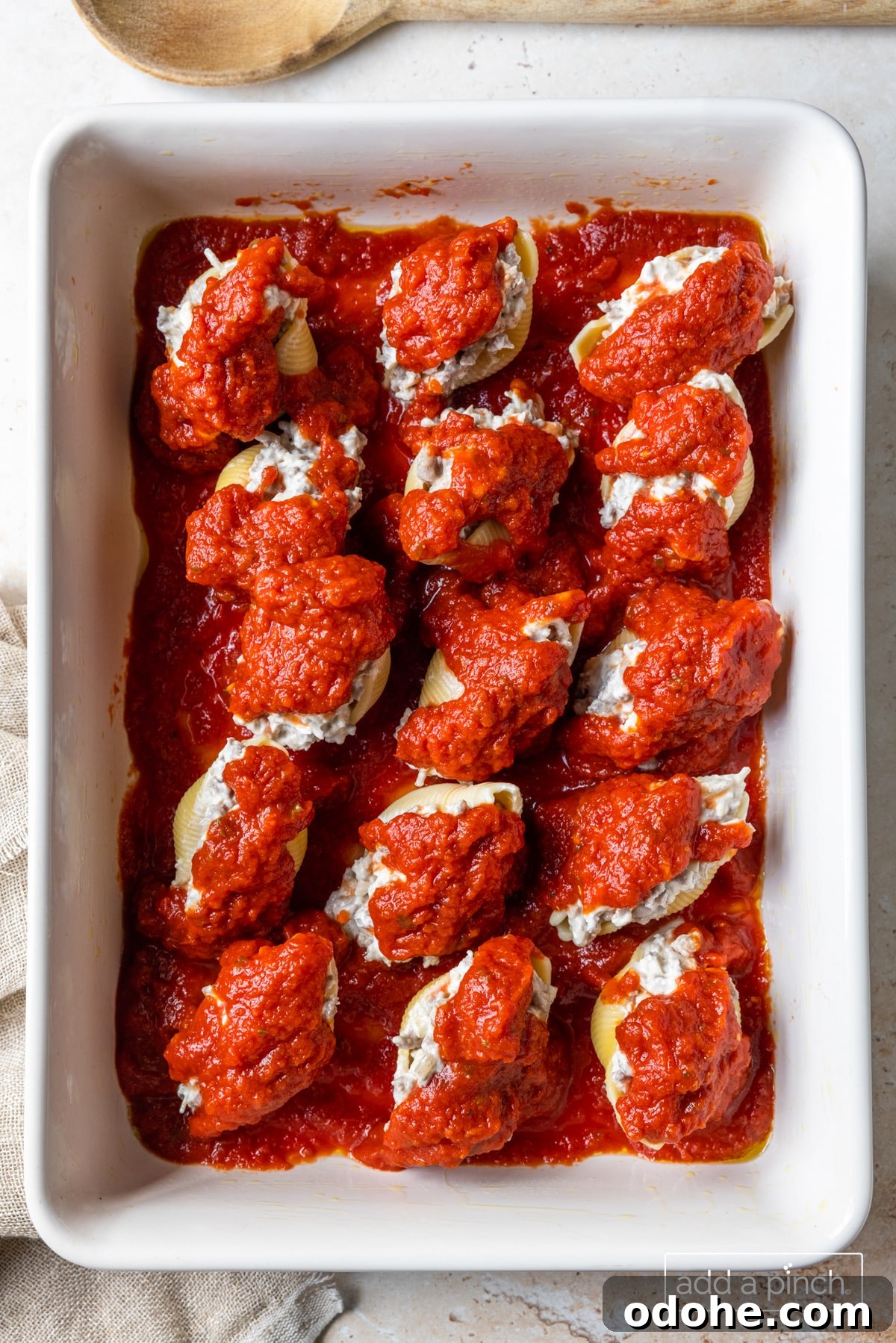 Image of stuffed shells ready to be baked.