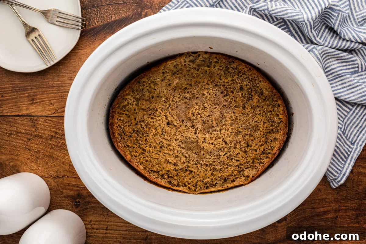 zucchini bread in a slow cooker, done cooking.