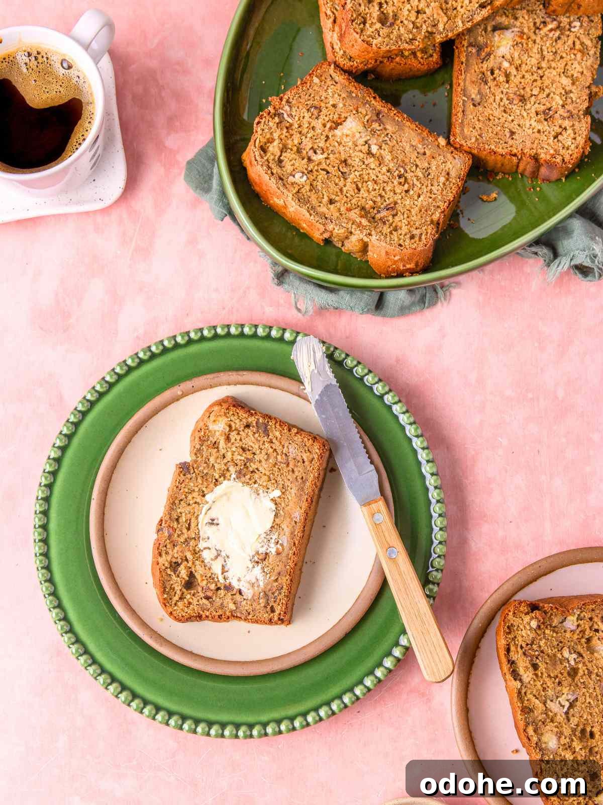 A slice of bread with a smear of butter.