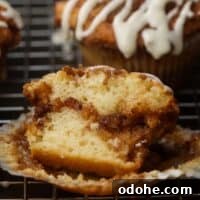 A Cinnamon roll muffin sliced in half