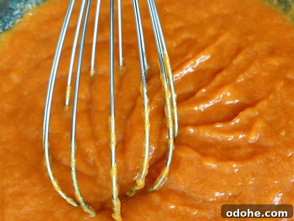 whisking wet ingredients together.
