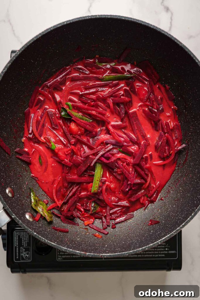 Authentic Sri Lankan Beetroot Curry Recipe with Coconut Milk 7 beetroot curry in the pot with coconut milk.