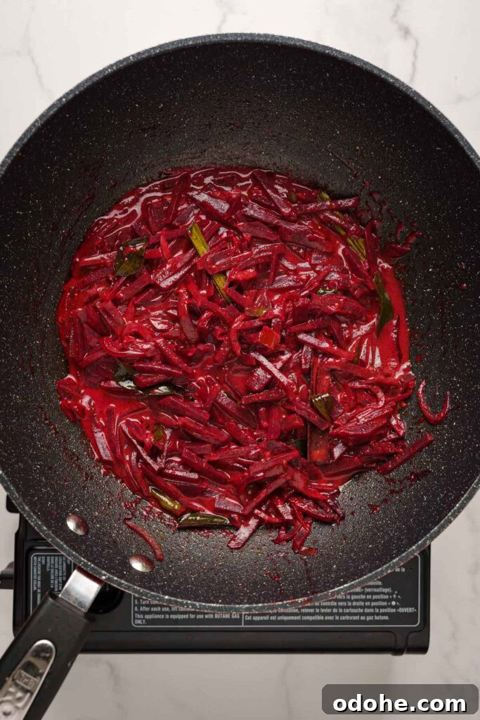 Authentic Sri Lankan Beetroot Curry Recipe with Coconut Milk 8 cooked beetroot curry in the pot.
