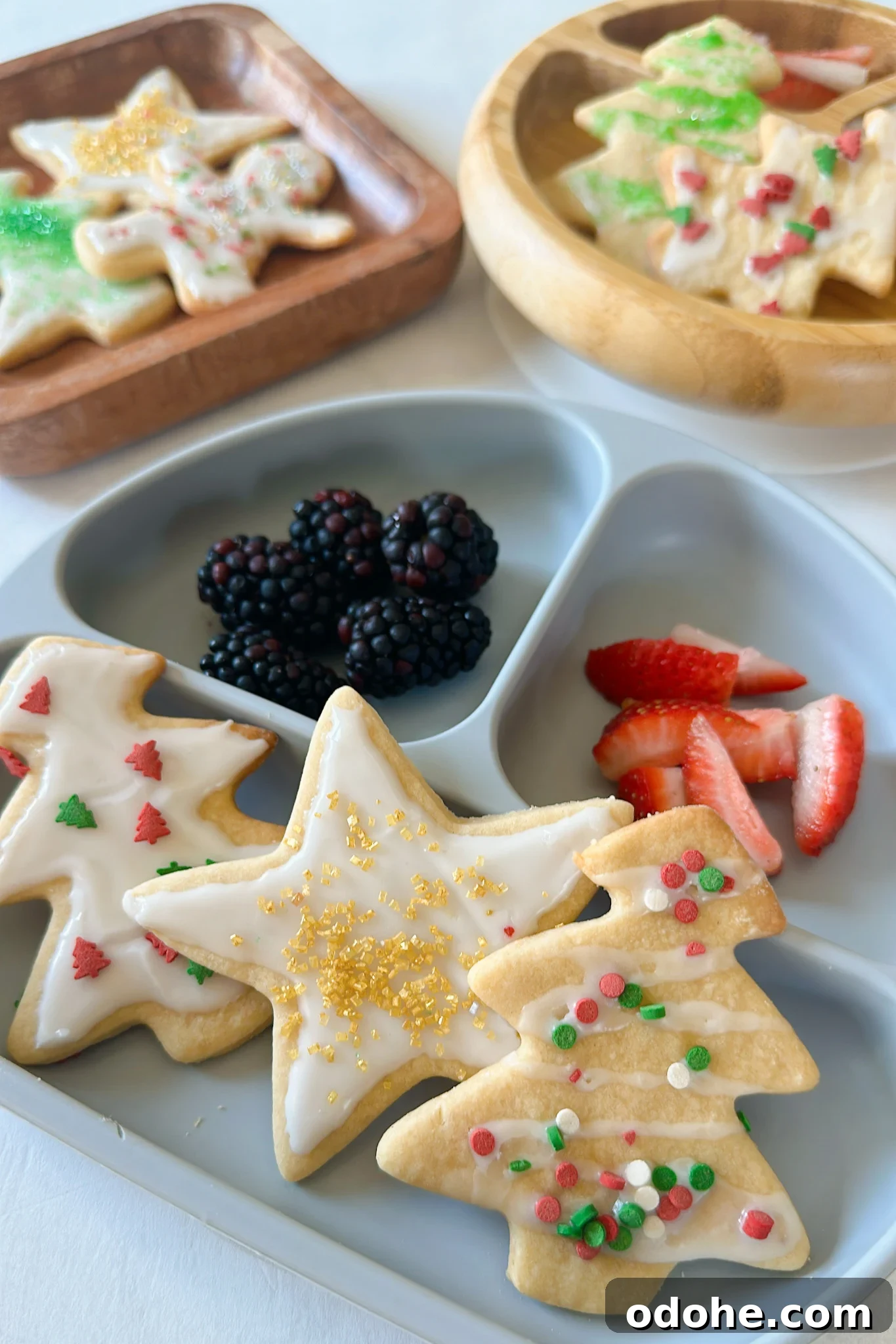 Maple sugar cookies served with berries and yogurt.