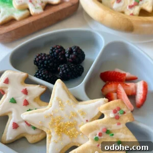 Maple sugar cookies served with berries and yogurt.