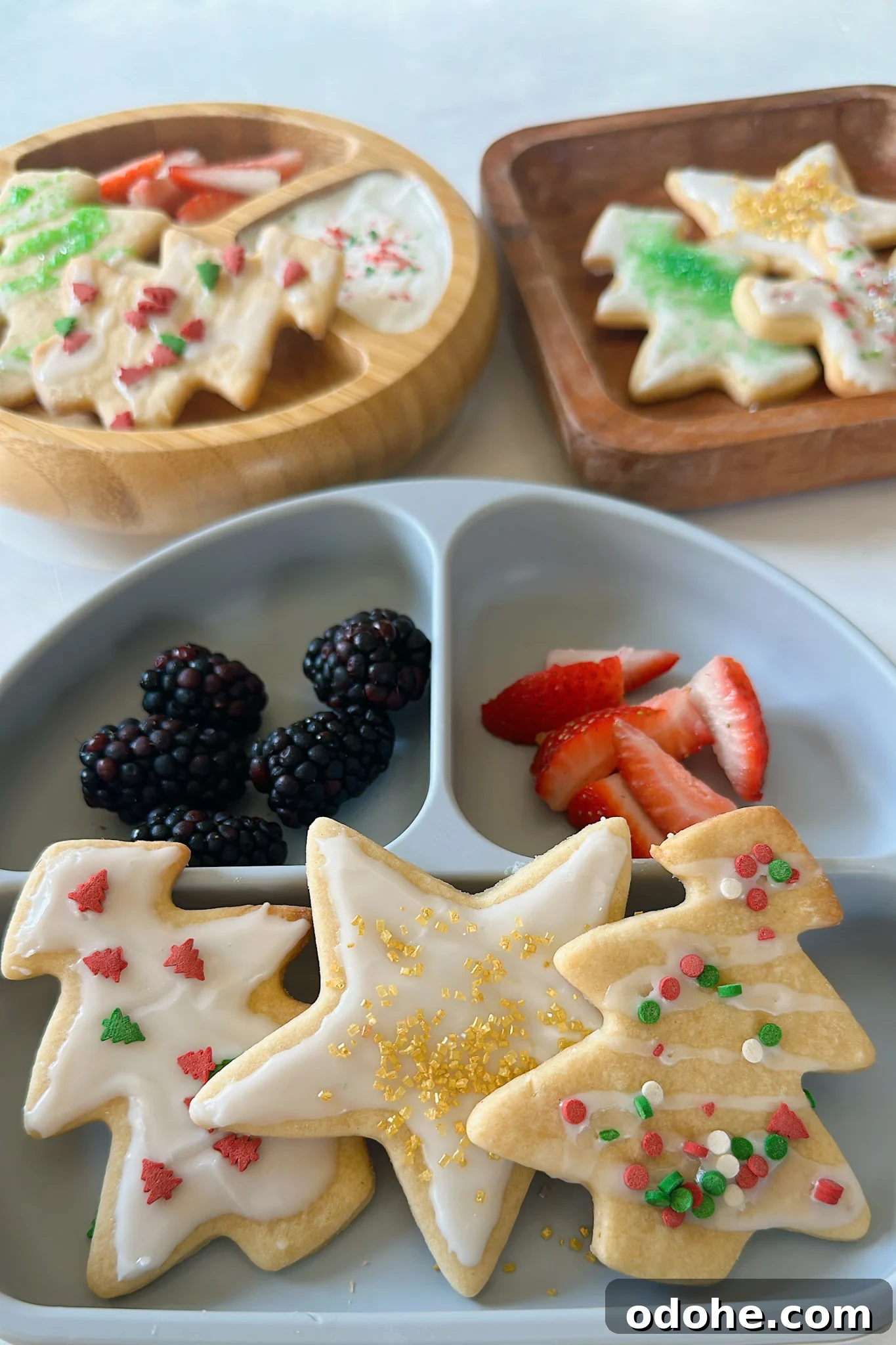 Maple sugar cookies served with berries and yogurt.