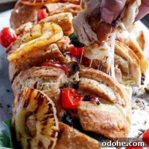Smoky BBQ Chicken-Stuffed Bread Recipe: Savory Pull-Apart Loaf 13 Barbecue Chicken Pizza Stuffed Pull Apart Bread on a baking tray