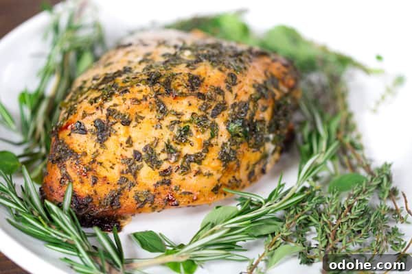 Herb-Butter Roasted Turkey Breast Recipe for Juicy Results 3 Herb Butter Roasted Turkey Breast with Herbs on the Plate