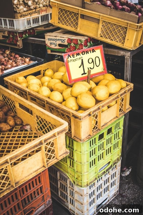 Central Market Athens: 10 Compelling Reasons to Visit the Varvakeios Food Market 12 Lemons for sale in a crate at the Central Market in Athens Greece.
