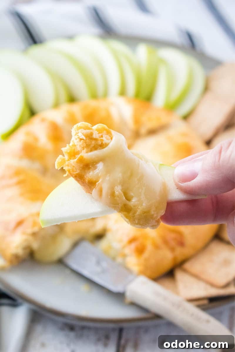 baked brie on an apple slice