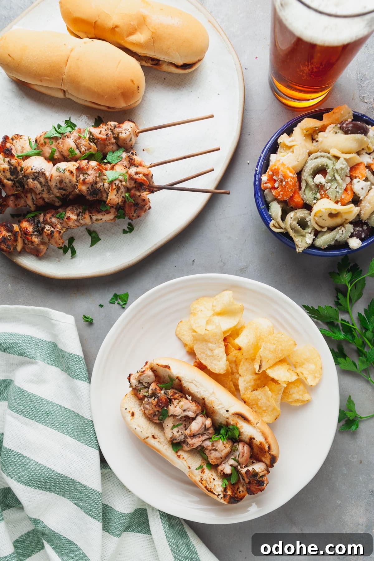 Homemade Chicken Spiedies: Low-Carb Gluten-Free Recipe 2 Overhead view of homemade chicken spiedies with pasta salad and a beer.