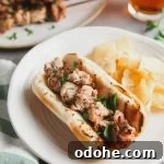 Homemade Chicken Spiedies: Low-Carb Gluten-Free Recipe 7 Chicken spiedie sandwich and chips on a plate.