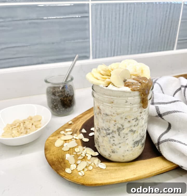 Creamy Almond Butter Overnight Oats Recipe 2 jar of almond butter overnight oats on a kitchen counter