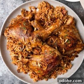 Authentic Kabsa: Arabic Chicken and Rice Recipe 10 overhead: plate of crispy, golden kabsa