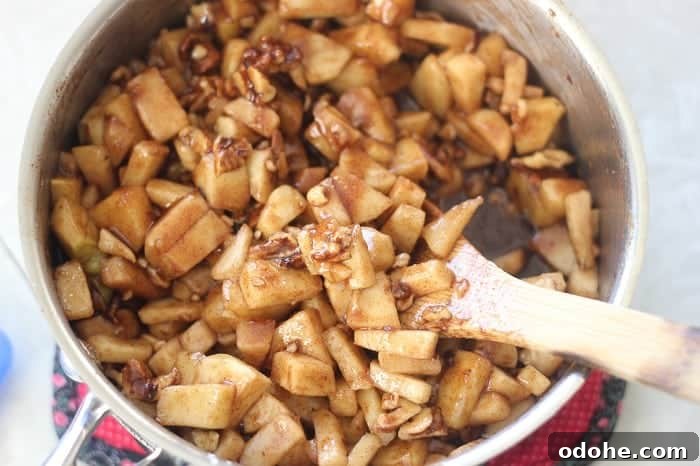 Apple Cinnamon Pull-Apart Bread Recipe 8 Apple cinnamon filling in pan.