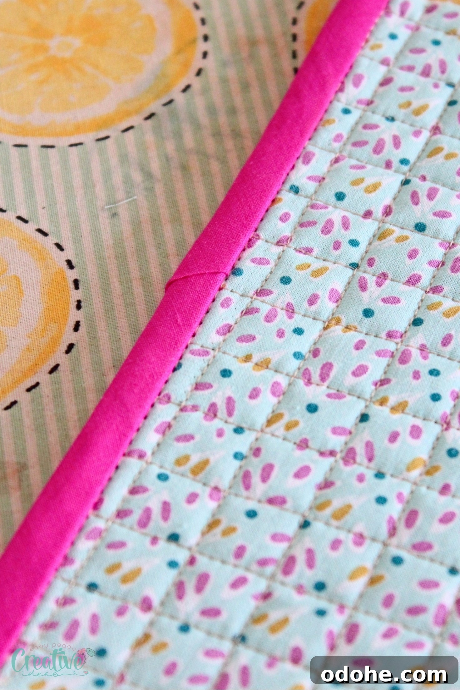 A detailed close-up of a quilted tablecloth